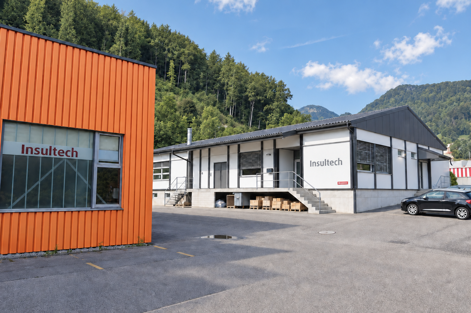 Bearbeitete Ansicht des Betriebsgebäudes der Insultech AG bei sonnigem Wetter